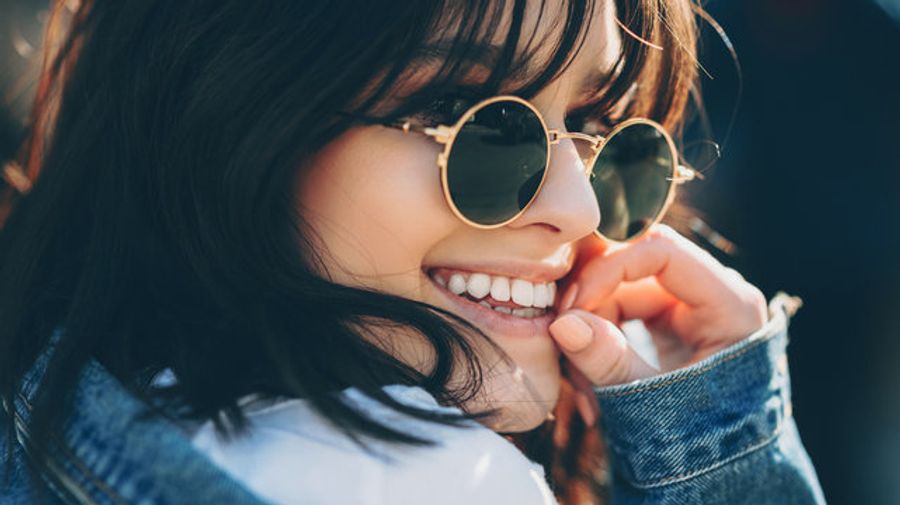 Woman Wearing Sunglass - Sunglasses Store