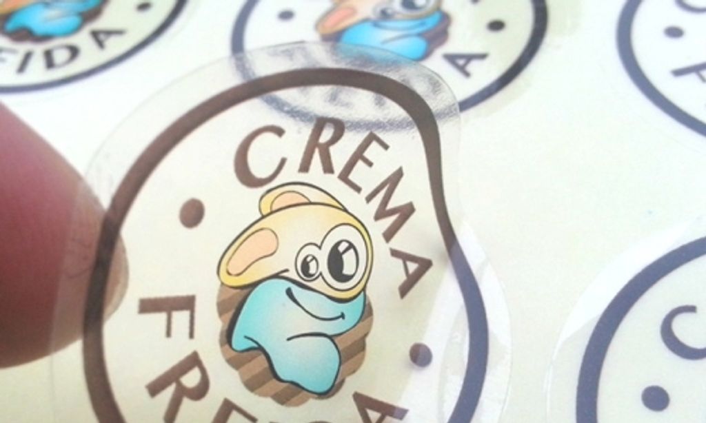 Transparent sticker with a full-colour character logo for product packaging