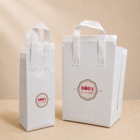 two sizes of custom printed white non-woven thermal cooler bags with logo