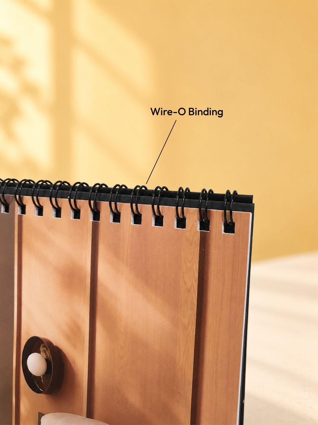 smooth wire-o binding detail on hard stand desk calendar