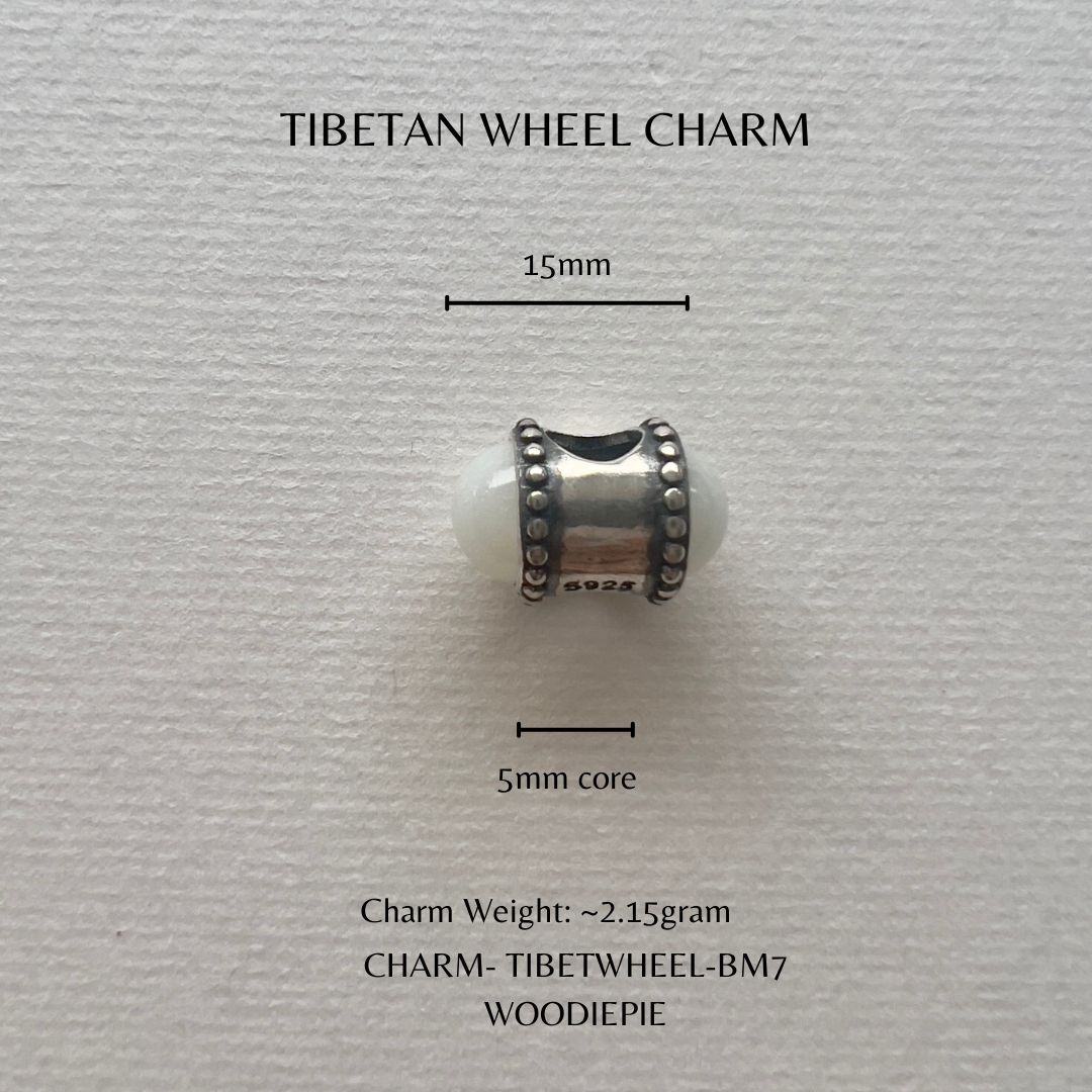 Tibetan Wheel Charm (3)