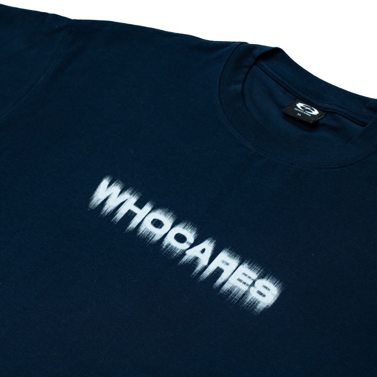 Whocares SS25 Capsule 04 Static Motion Navy Flat Lay (1) Large