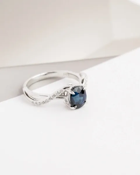AXORA Swirl Blue Sapphire Solitaire Ring_11zon