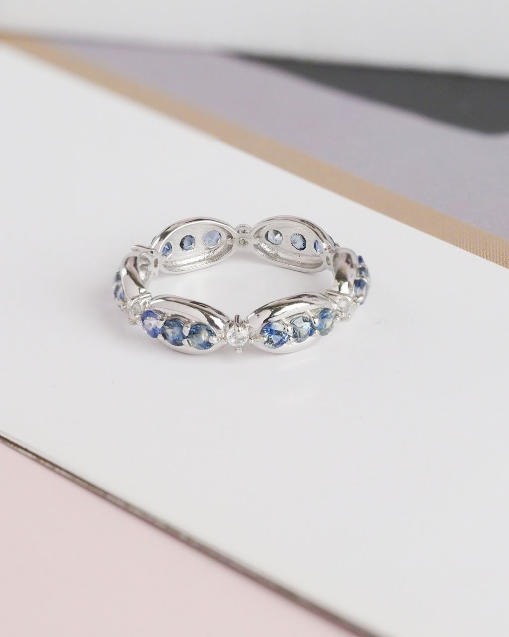 AXORA blue sapphire eternity ring