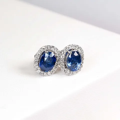 194-carats-blue-sapphire-with-026-carats-diamond-halo-earrings-359132