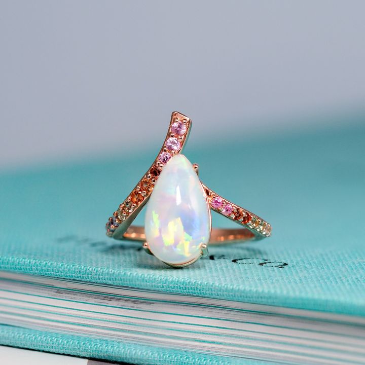 axora แหวนพลอยโอปอลเอธิโอเปีย (Ethiopia Opal) ล้อมพลอยแซฟไฟร์และแทนซาไนท์