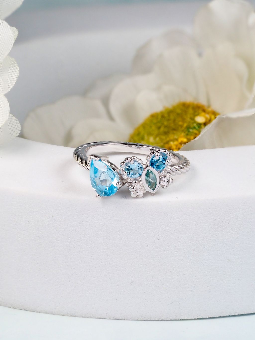 AXORA Petite Butterfly Blue topaz ring front