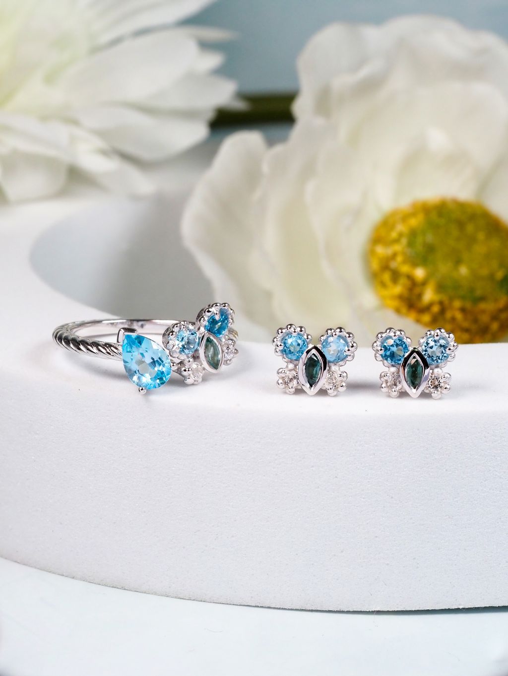 AXORA Petite Butterfly Blue topaz compose shot