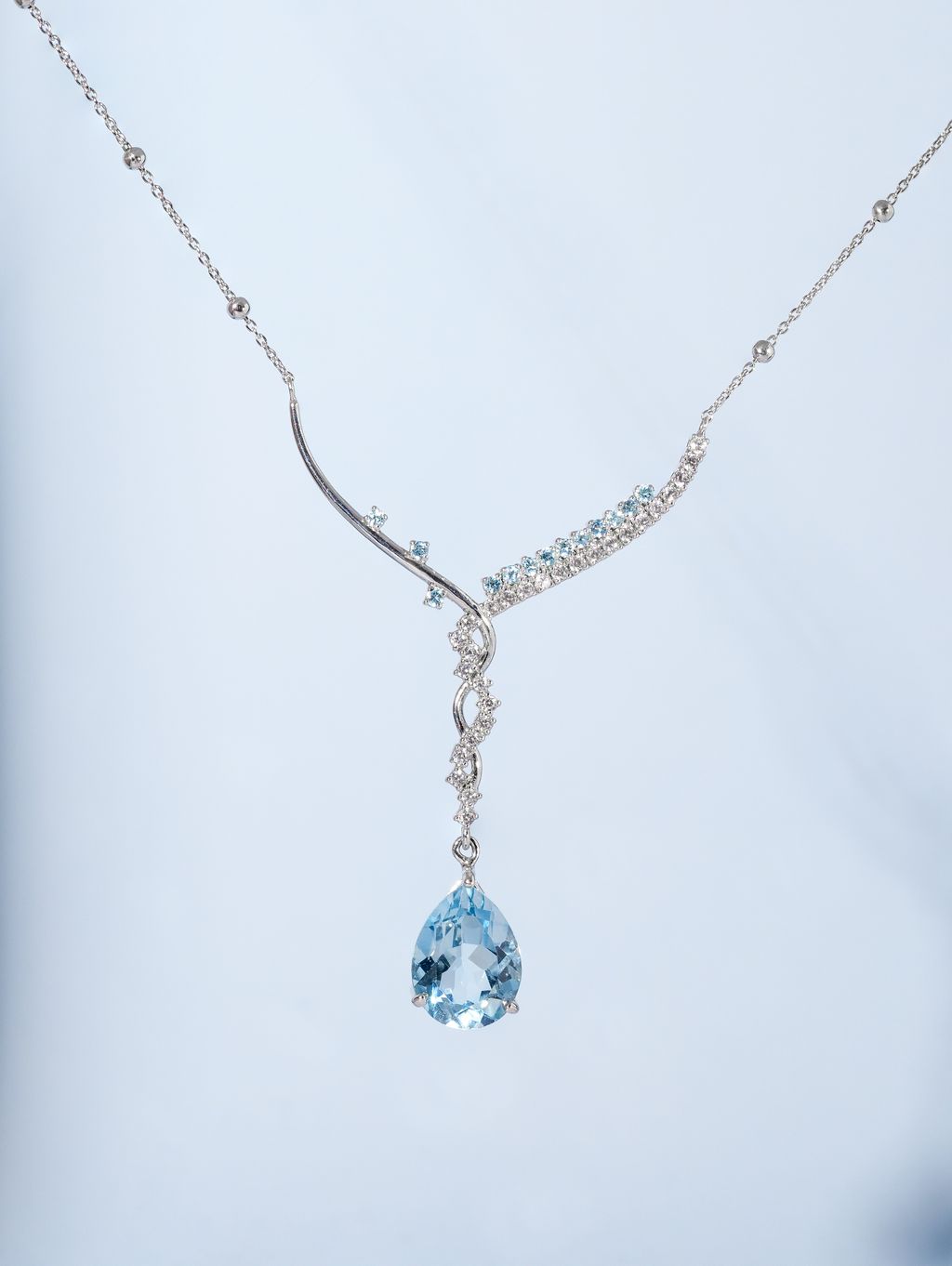 Swirl necklace  Blue Topaz