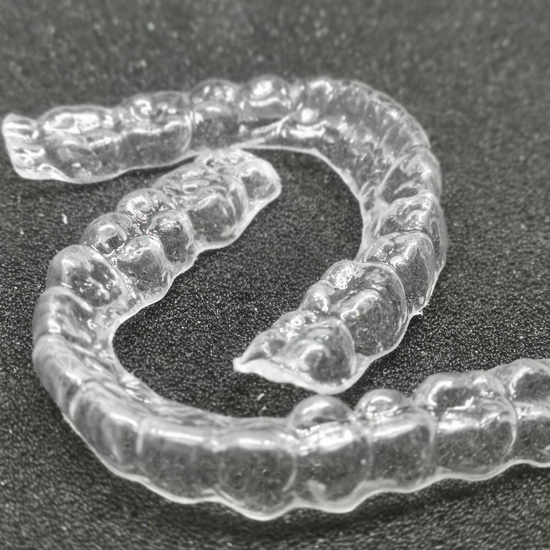 Clear Plastic Retainer | Nexus Denture Lab Services