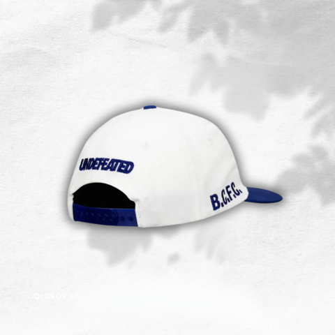 UNDEFEATED X 伯明翰城 聯名帽子 藍白款 正面圖