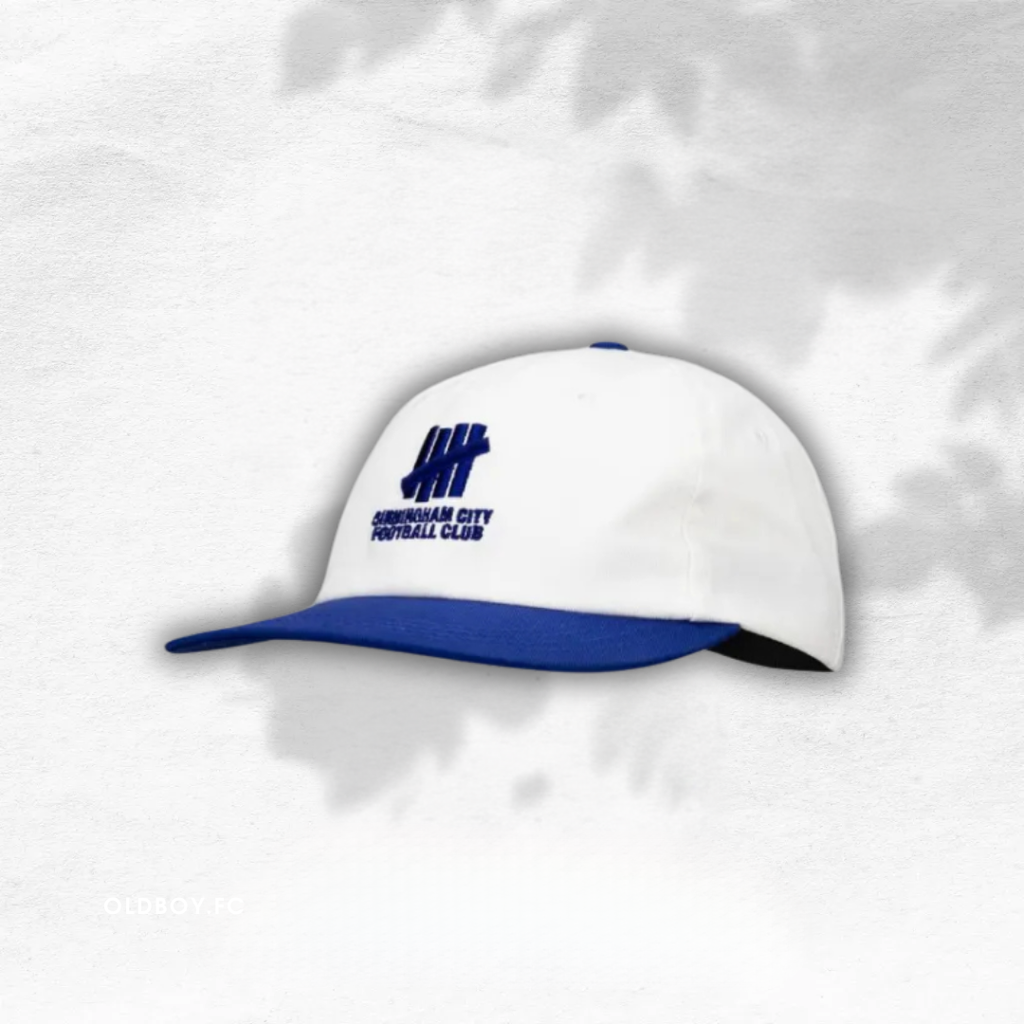 UNDEFEATED X 伯明翰城 聯名帽子 藍白款 正面圖