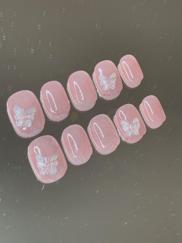 114011702