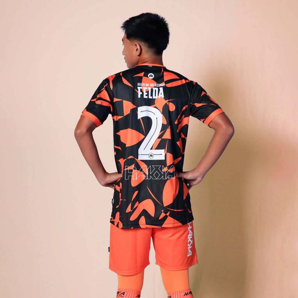 AKADEMI-BOLA-SEPAK-FELDA-FANS-ISSUE-2024-HOME-ORANGE-KIDS-4