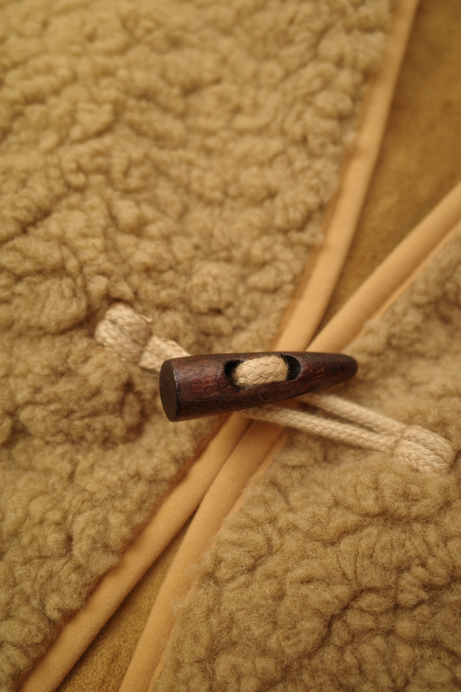 雙口袋鈕扣仿羊羔絨寬版背心