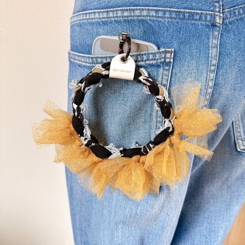 手機黃+黑底亮金