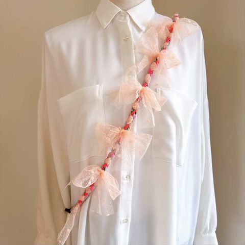 蝴蝶結粉橘手機背繩_2026