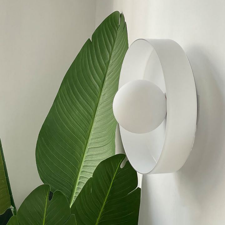 nordic-white-round-wall-sconce-bedroom