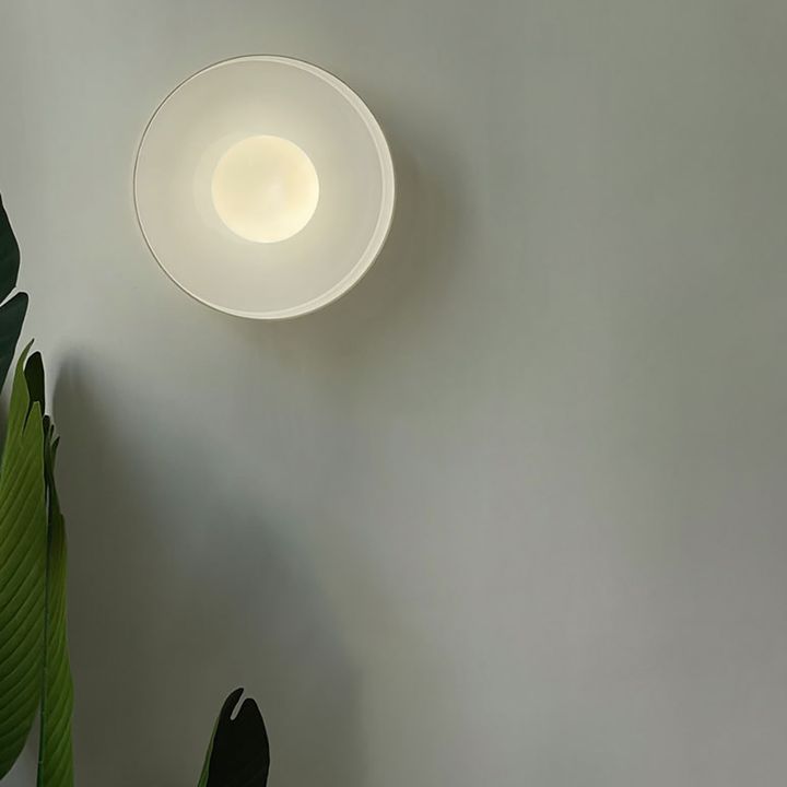 minimalist-round-wall-lamp-warm-light-on