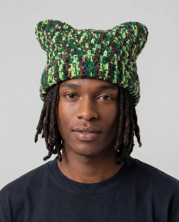Generated_with_Kiveai_-_CAT_HAT_PROMPT_HAVE_THIS_MODEL_WEARING_THIS_Arkyve_crochet_hatuse_clean_product_lighting__soft_shadows__neutral_seamless_background_High-resolution__crisp_deta_480035c9-4825-4100-88ad-1f30c6651149