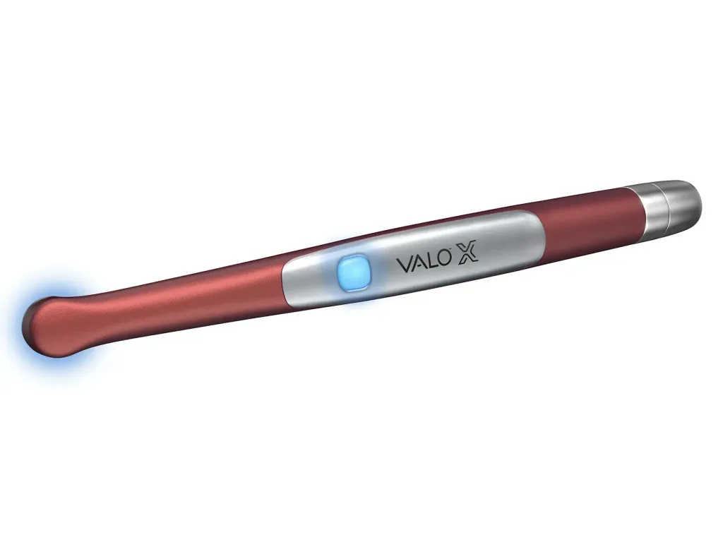6496-VALO-X-Colors-Curing-Light-Red-lying-down-EQUIPMENT