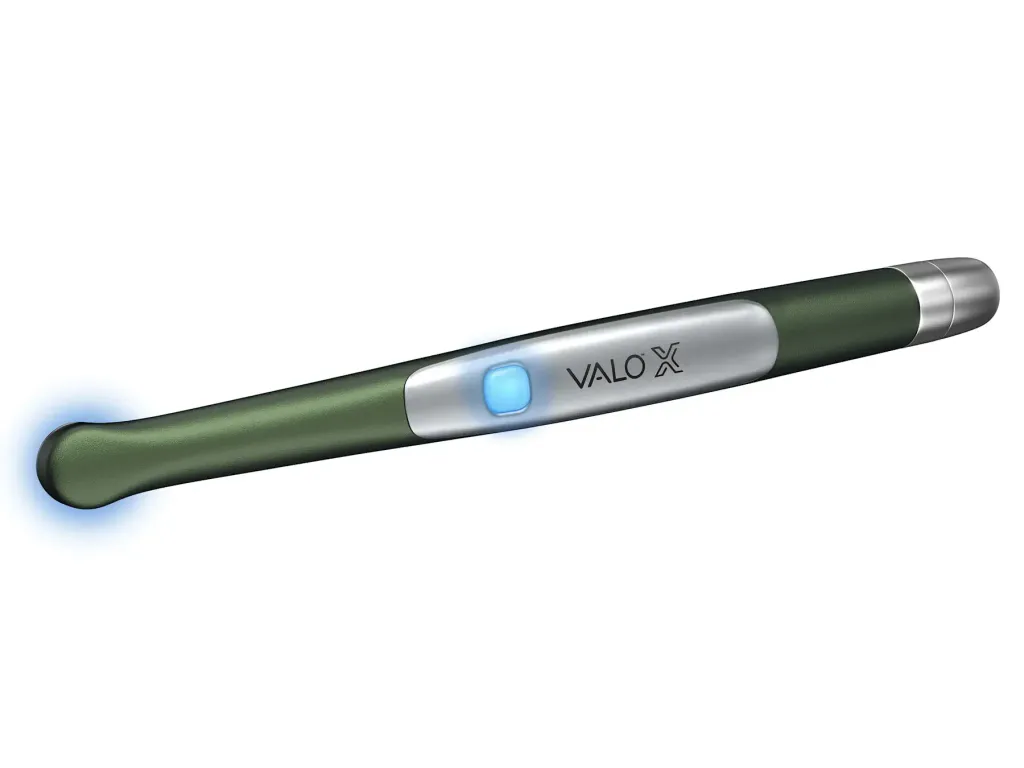 6499-VALO-X-Colors-Curing-Light-Green-lying-down-EQUIPMENT