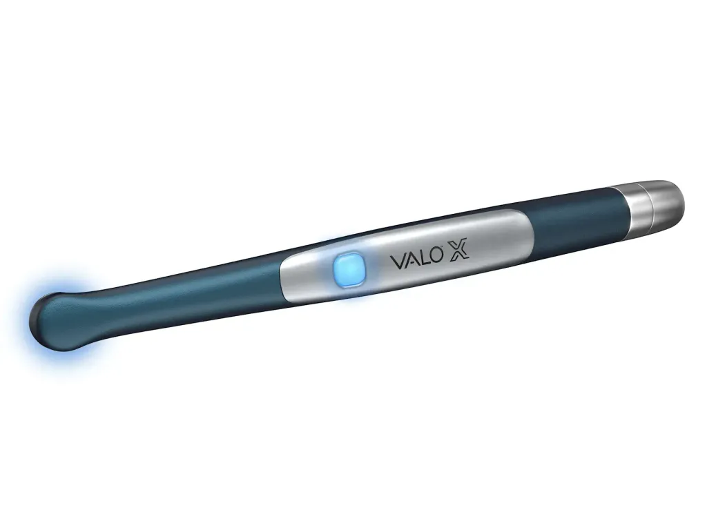 6519-VALO-X-Colors-Curing-Light-Blue-lying-down-EQUIPMENT