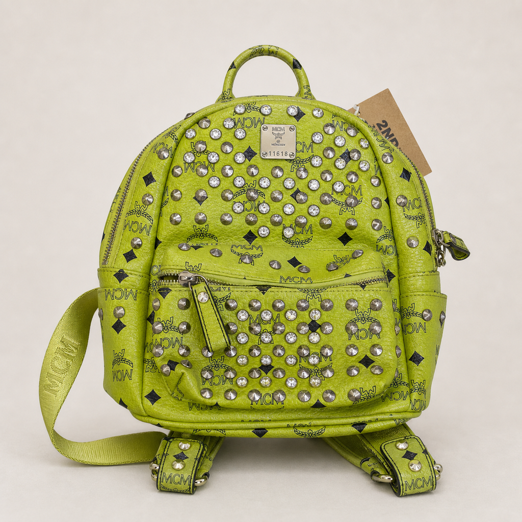 015_16640434_mcm_studded_backpack_green_ai_lightbg