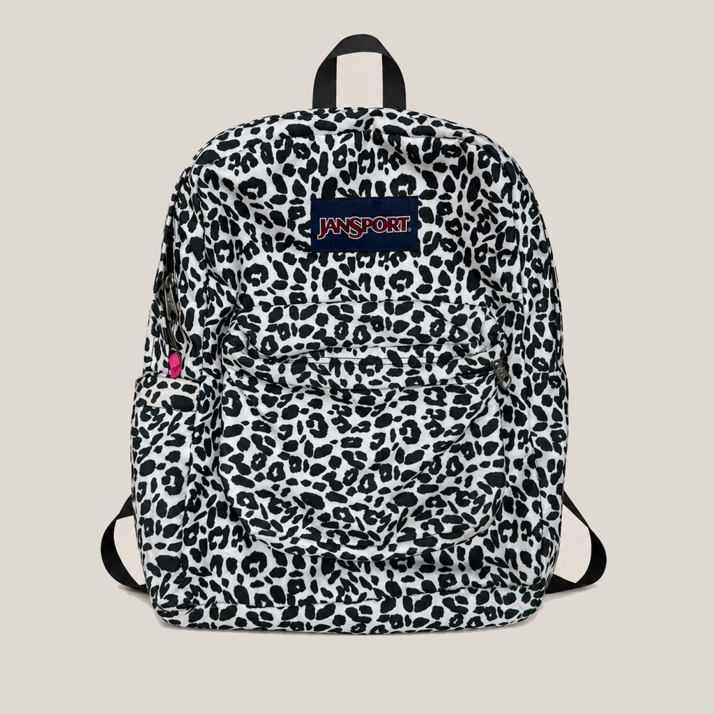 16_2NDS0712016_jansport_black_white_leopard_print_backpack_main_bgfixed