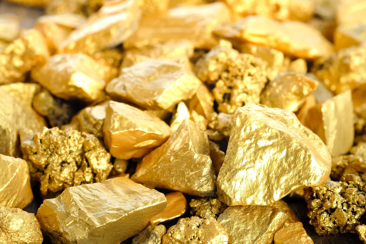 close-up-lump-of-gold-mine-background-texture.jpg