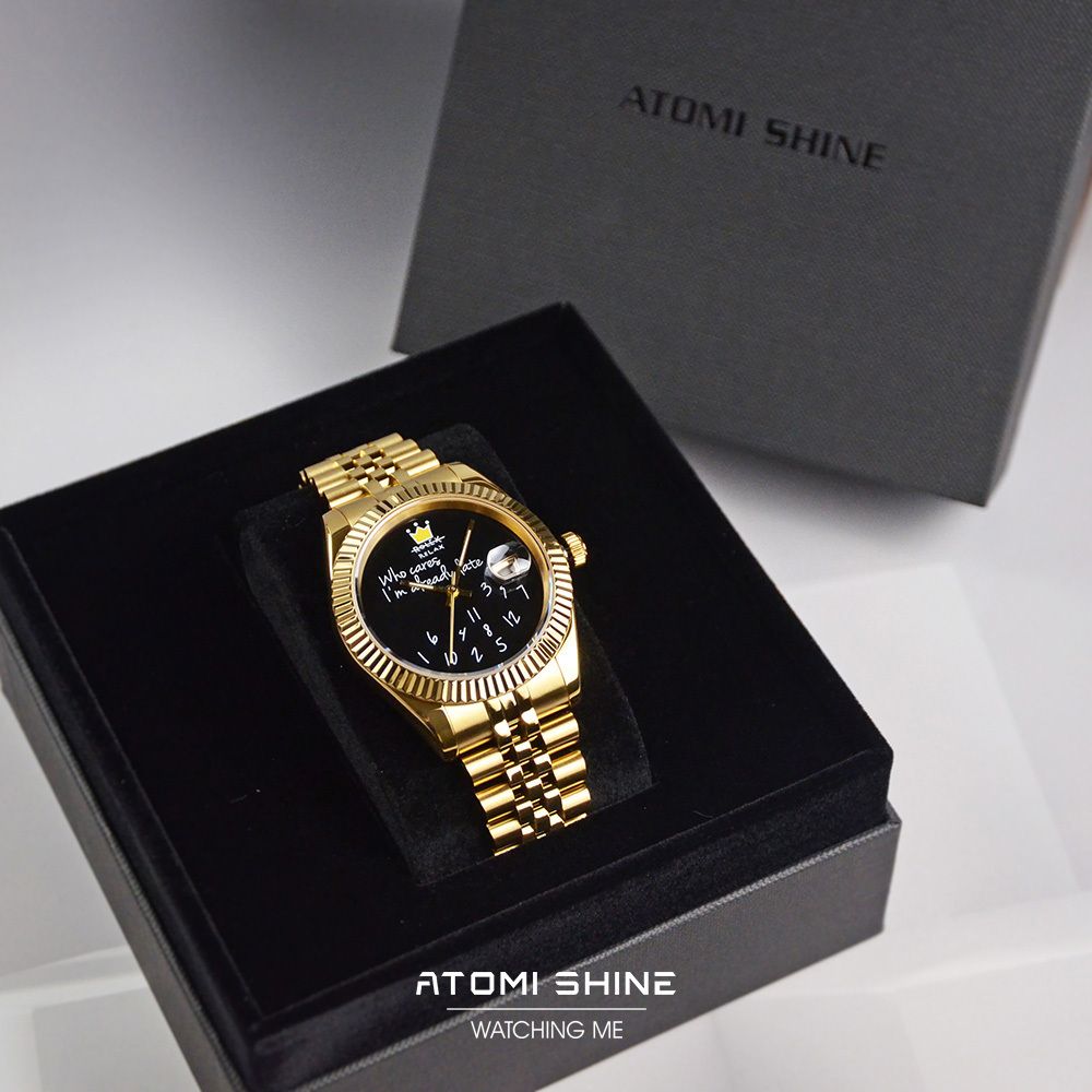 ATOMISHINE｜EONDATE MAXI CLASSIC 系列 Golden Jest｜手繪風格 黑色錶面 金色不鏽鋼 自動機械腕錶 日期顯示 盒裝展示