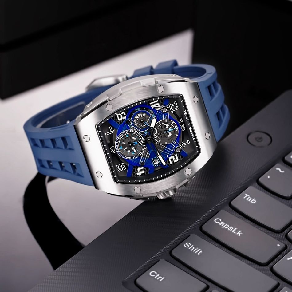 Tsar Bomba 機械公爵 | 元素系列 TB8211Q-03 | 銀錶框 藍色氟橡膠錶帶 鏤空錶盤 石英錶橫躺展示