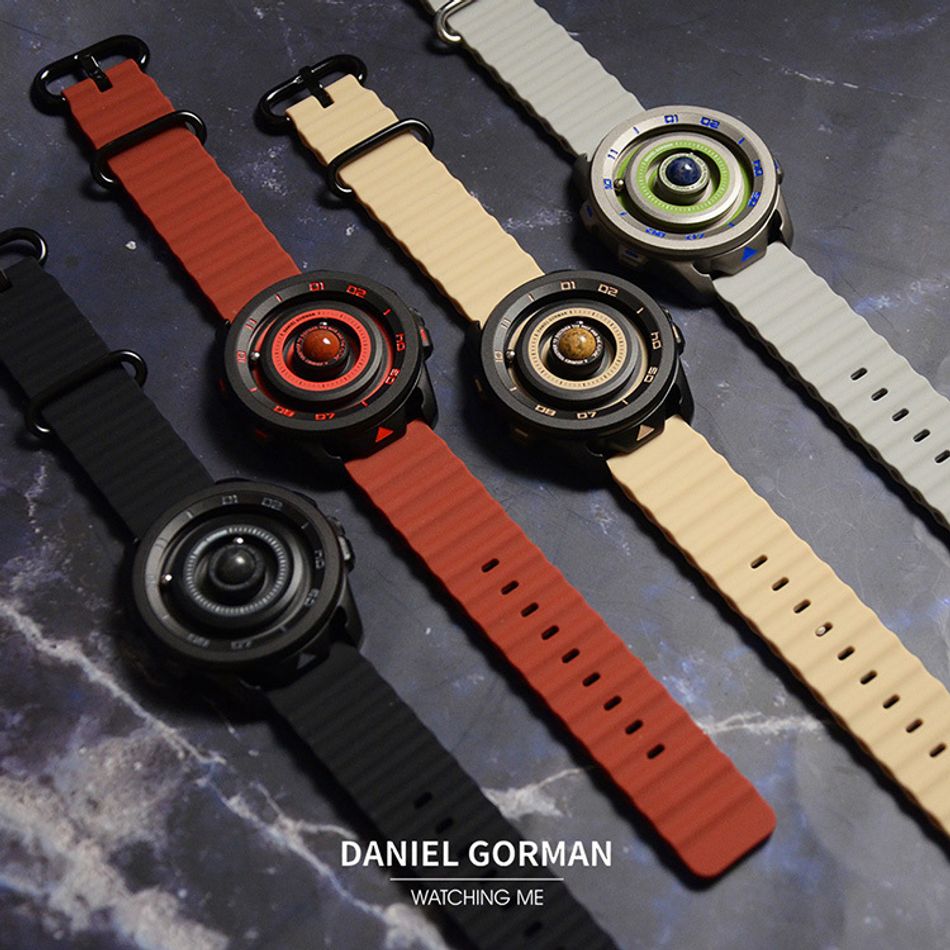 DANIEL GORMAN ｜萬有引力系列 DG0525KB ｜土星款 磁吸指針 黑色框 卡其色矽膠錶帶系列圖