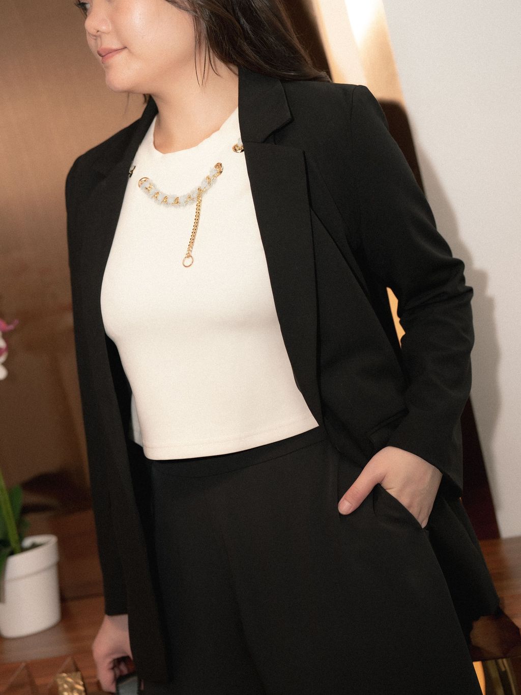 Front view of Sleek Curve Blazer showing clean lapel and structured silhouette