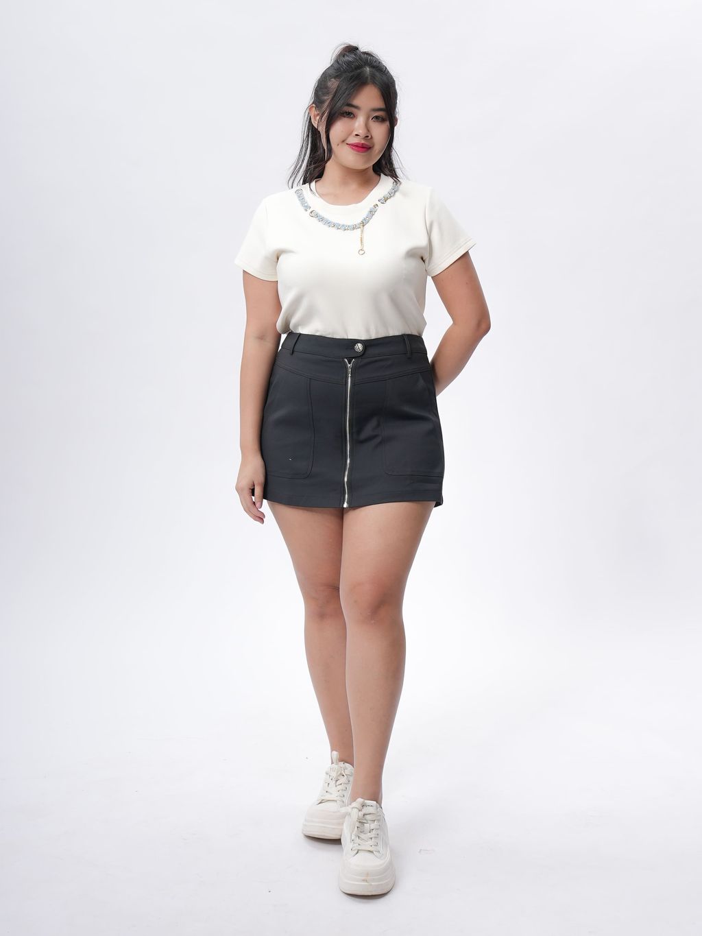 Short-sleeve top with necklace-inspired tweed trim designed for plus-size curves