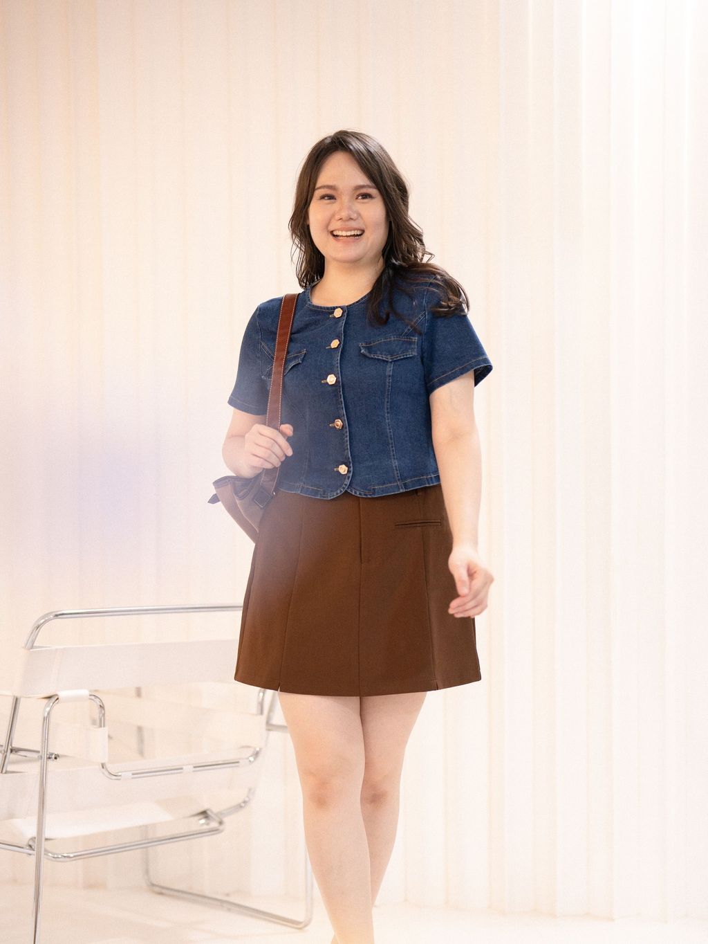 Back view of plus-size denim cropped blouse