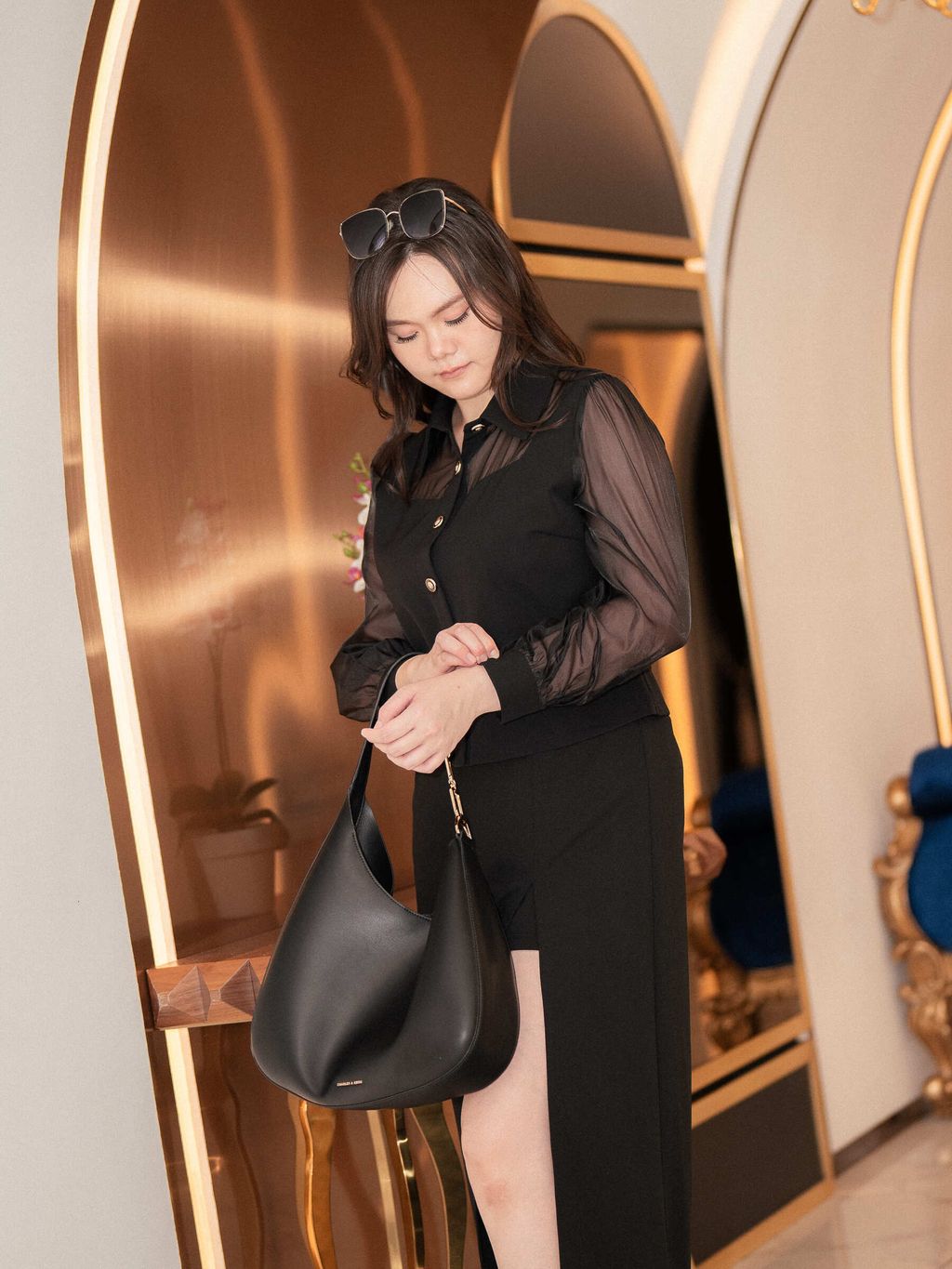 Classy blouse design for plus-size women with feminine sheer details.