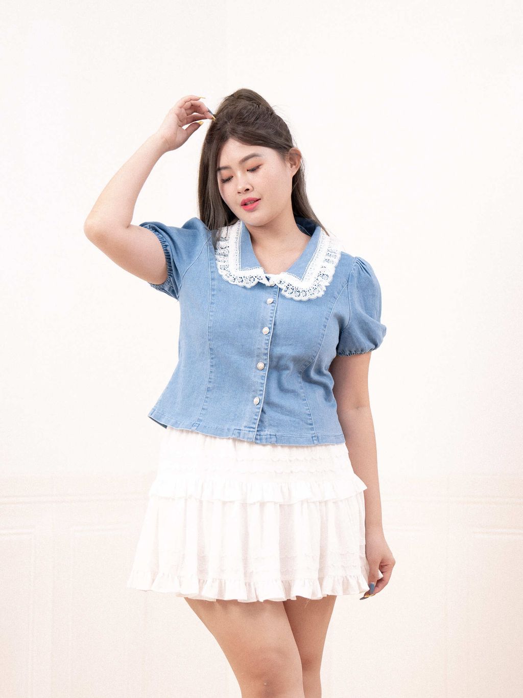 Puff sleeve detail adds soft volume to the arms