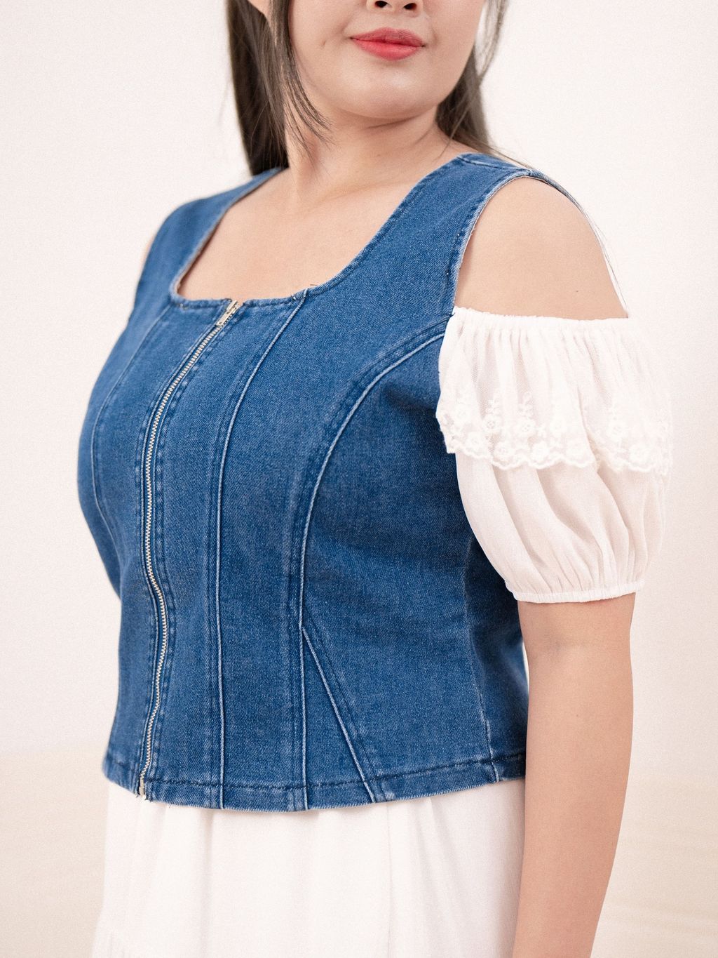 Denim top with wide shoulder straps and vertical panel stitching