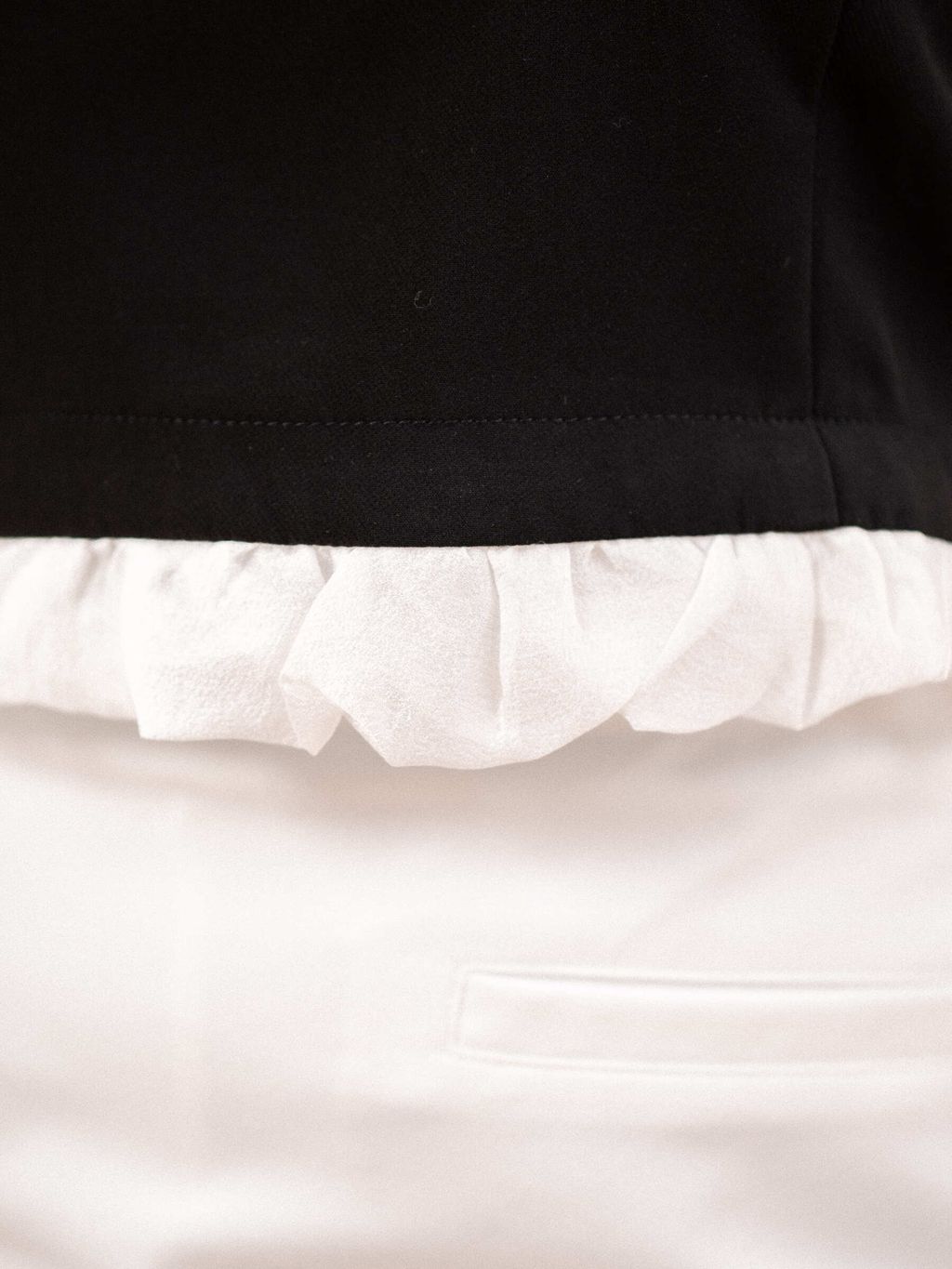 Contrast ruffle hem detail in soft fabric