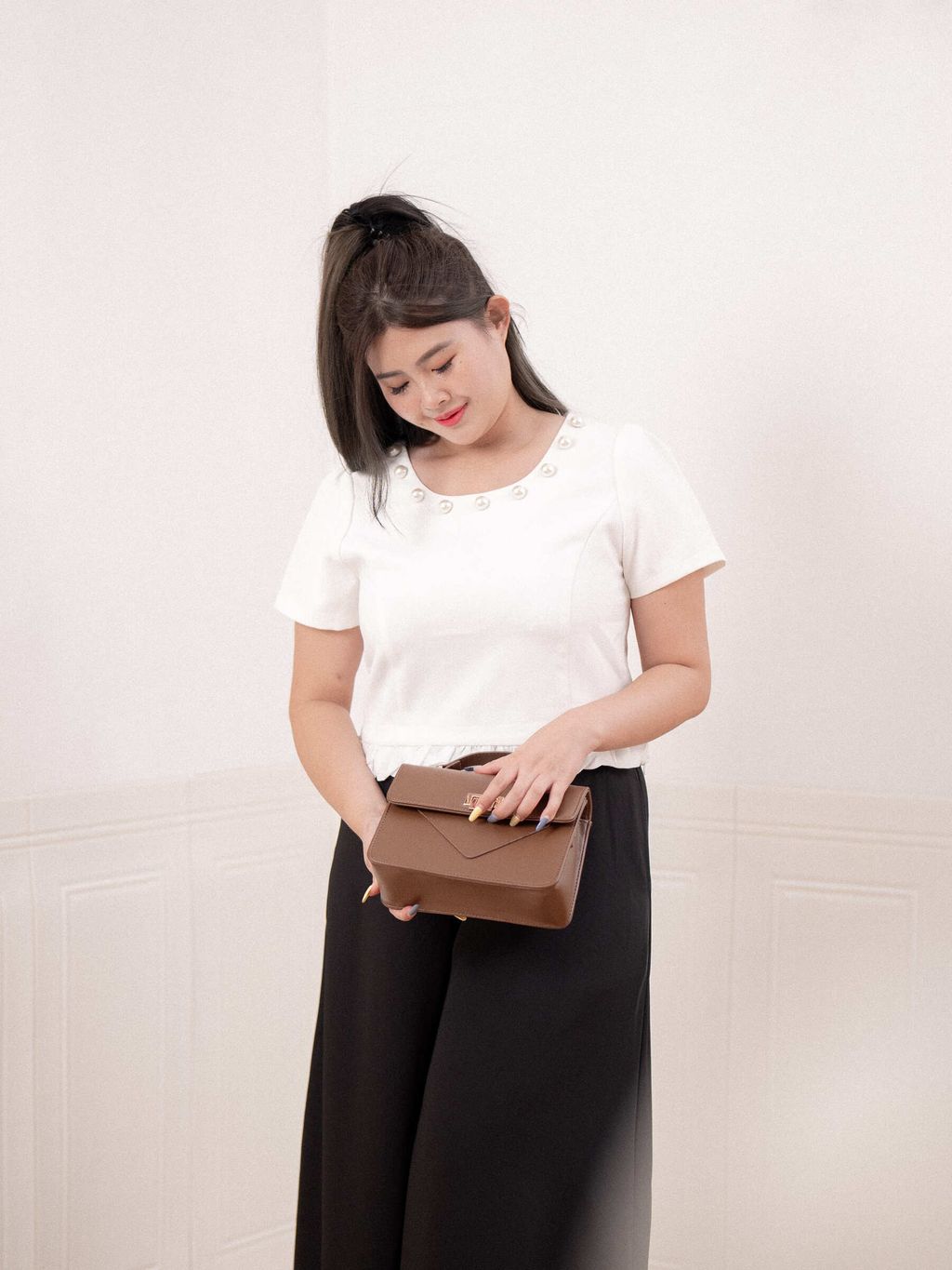 Scoop neck blouse with statement pearls for plus size women