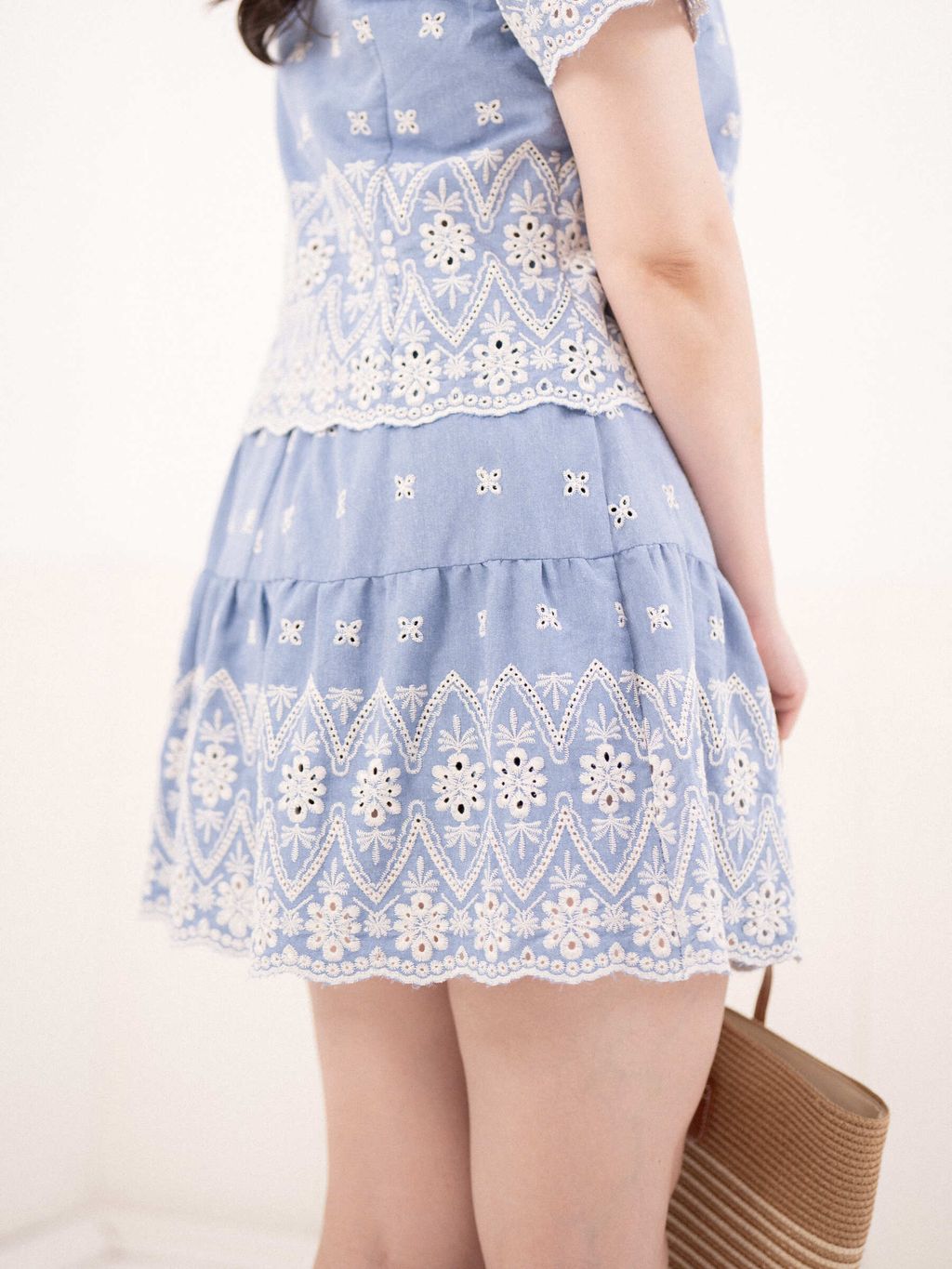Close-up of the tiered eyelet embroidery skirt design