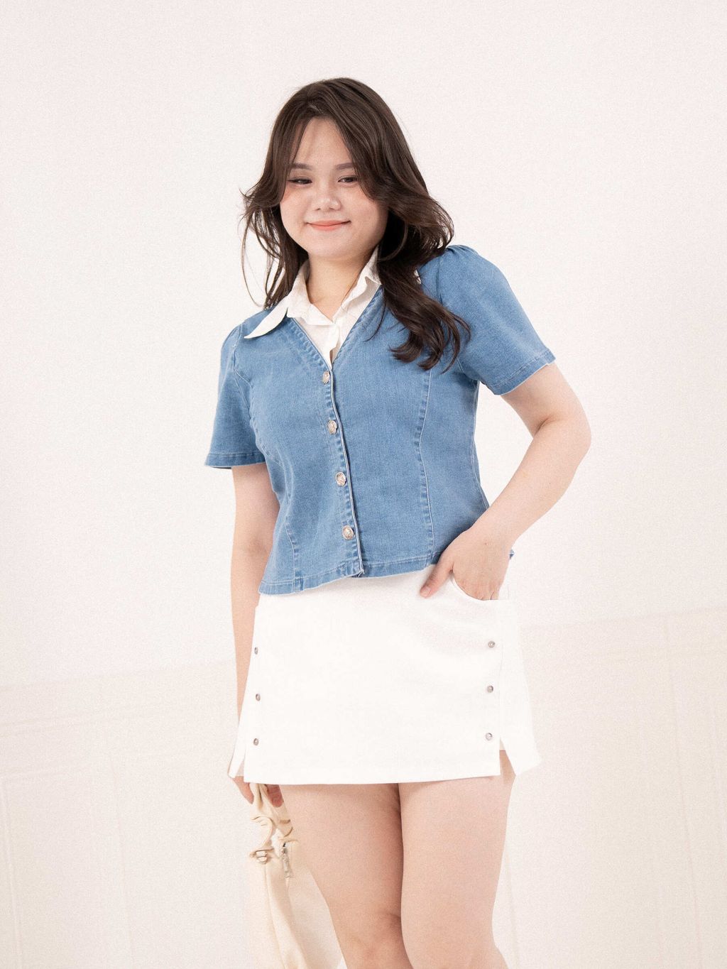 A-line skort with pocket and button details for plus-size women