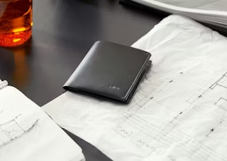 Fully-featured, slim billfold wallet with clever design tricks for easy accessibility and organization