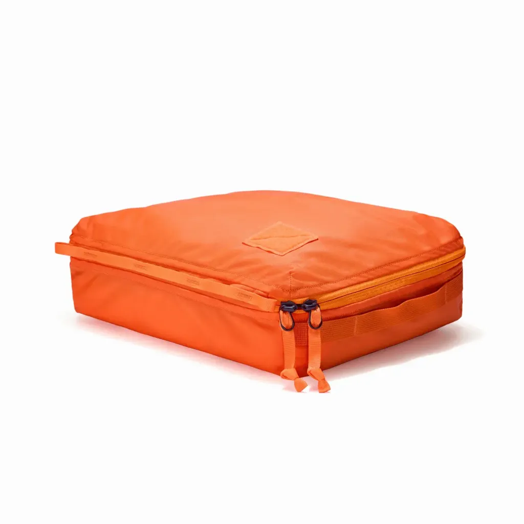 TRANSIT-PACKING-CUBE-10L-TPC8-HOT-ORANGE-SIDE-ANGLE-min_2000x