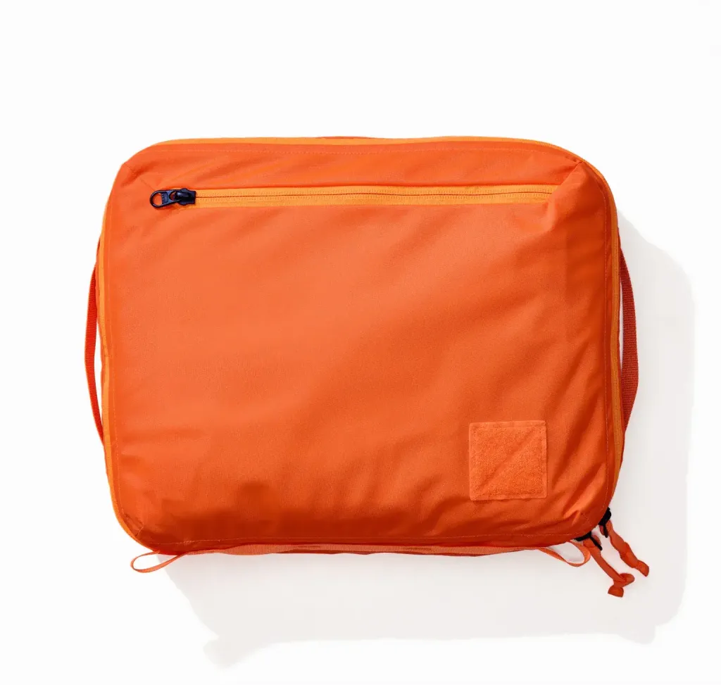 TRANSIT-PACKING-CUBE-10L-TPC8-HOT-ORANGE-EXTERNAL-ZIPPER-POCKET-min_2000x