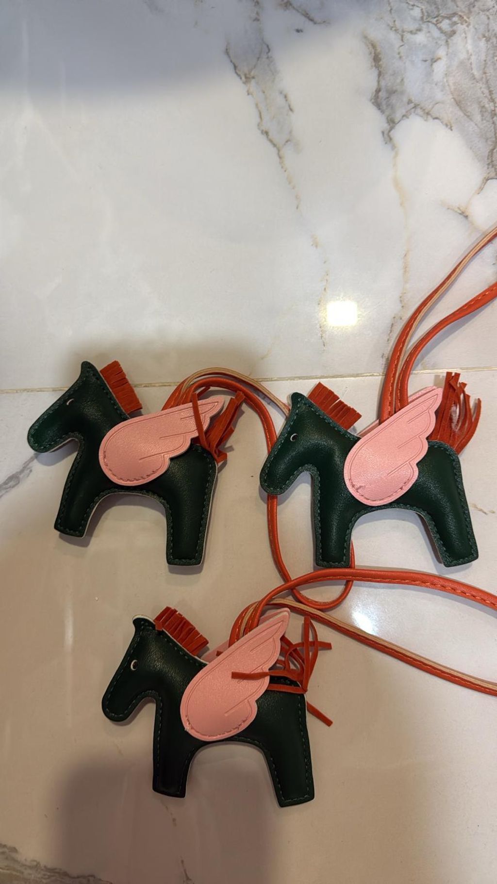 horse- green pink wing