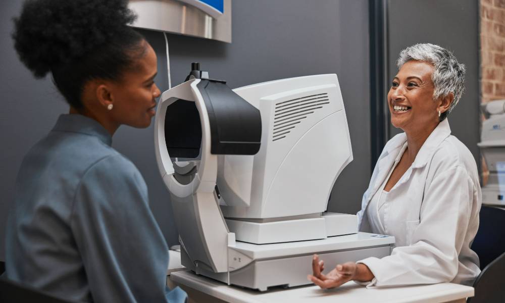 eye-doctor-happy-or-black-woman-consulting-for-ey-2023-11-27-05-25-00-utc-1