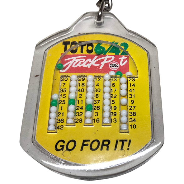 Play Toto 6 42 Jackpot Keychain Dice Front Close Up
