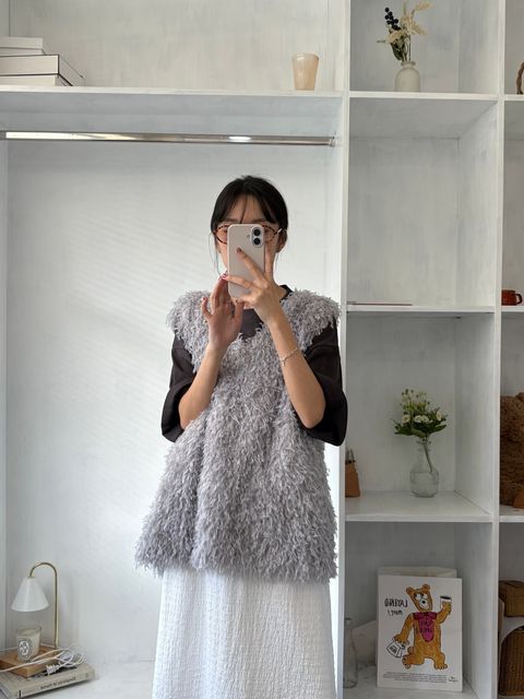 feathery-flowing-vest.jpg